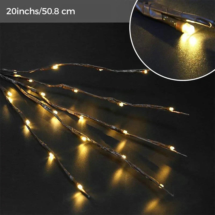 LED-Lichterzweig mit feinen Lichtpunkten an den Zweigen