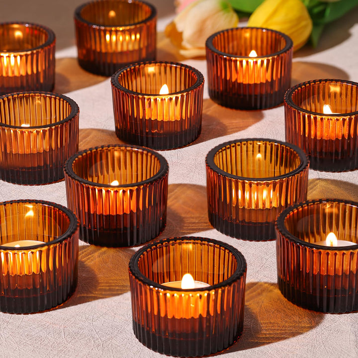 24 bernsteinfarbene Teelichthalter aus Glas als Set