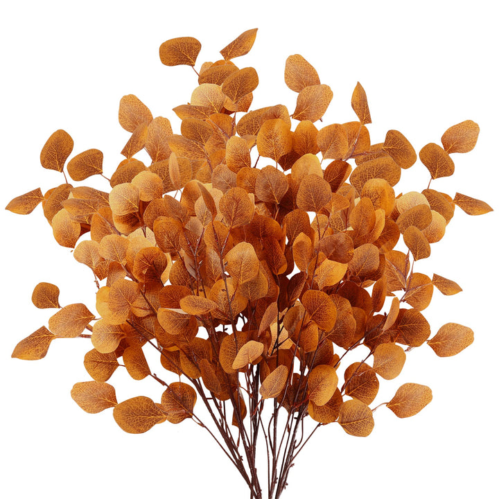 Sechs künstliche Eukalyptusblätter in Orange als herbstliche Dekoration