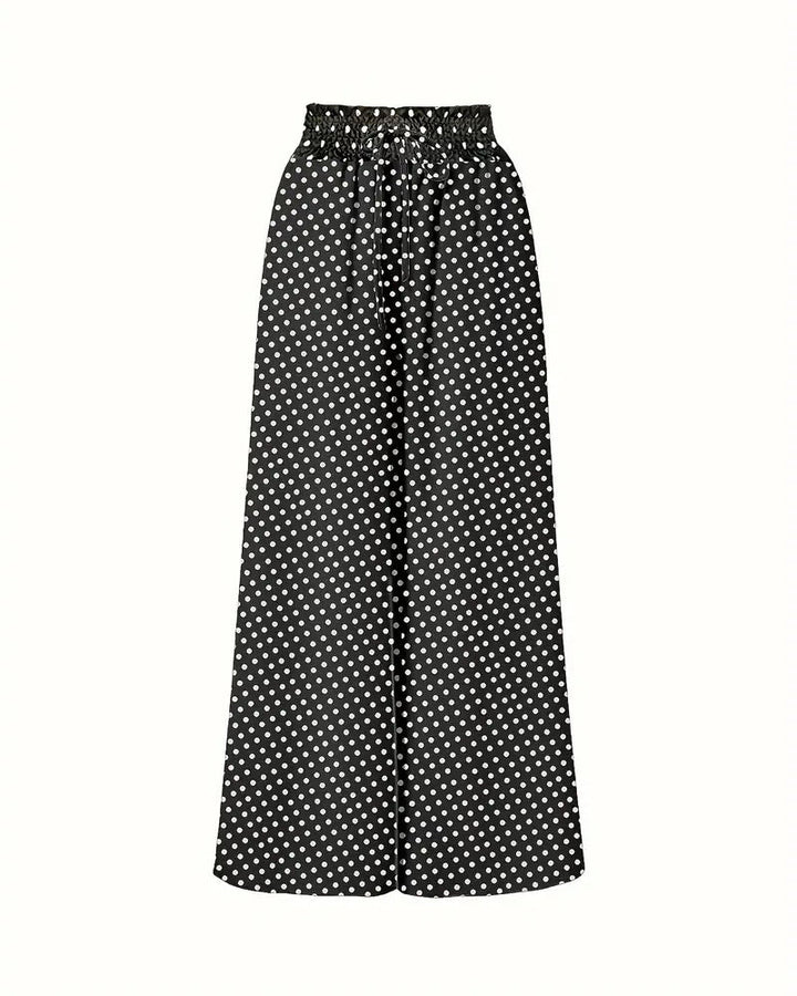 Hose mit Punktemuster und fließender Silhouette in Vorderansicht