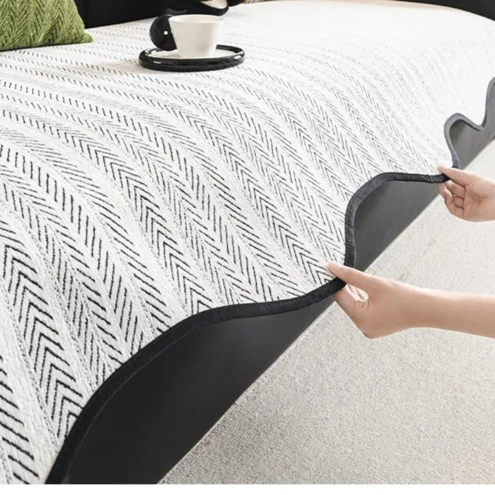 Sofahusse mit Fischgrätenmuster – Überwurf mit Wellenkante