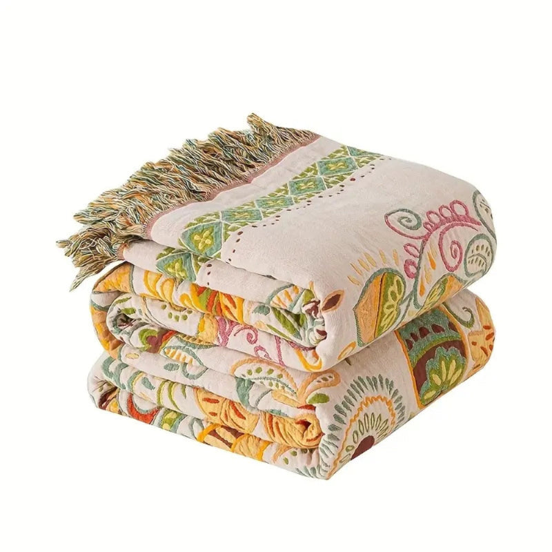 Baumwolldecke Boho – Wendeplaid mit floralem Muster und Fransen