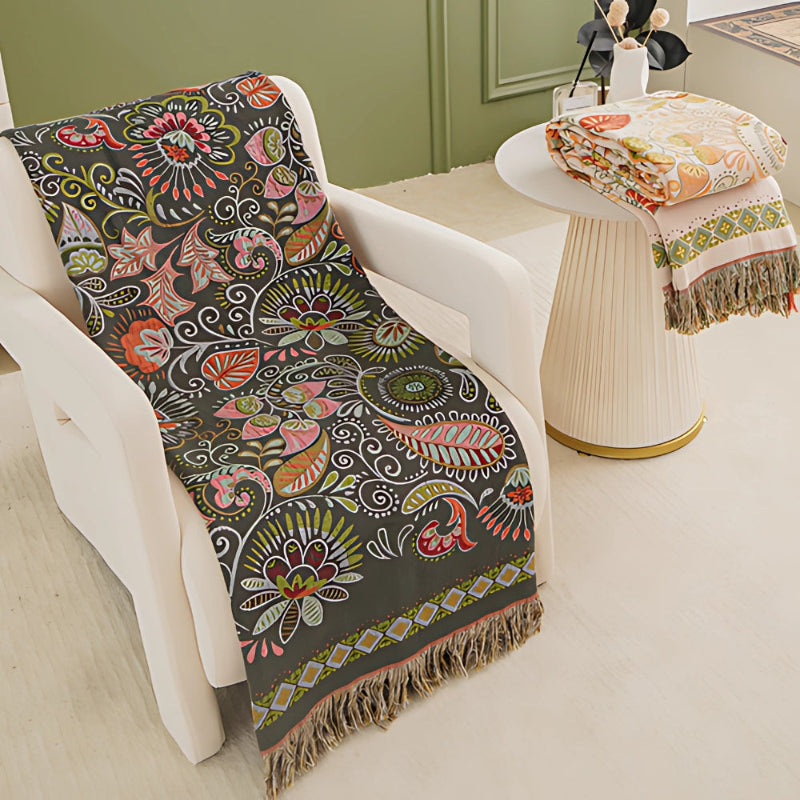 Baumwolldecke Boho – Wendeplaid mit floralem Muster und Fransen