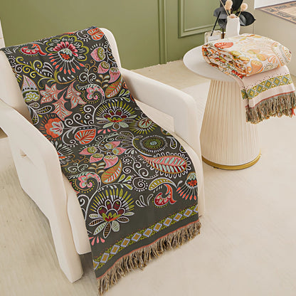 Baumwolldecke Boho – Wendeplaid mit floralem Muster und Fransen
