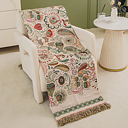 Baumwolldecke Boho – Wendeplaid mit floralem Muster und Fransen