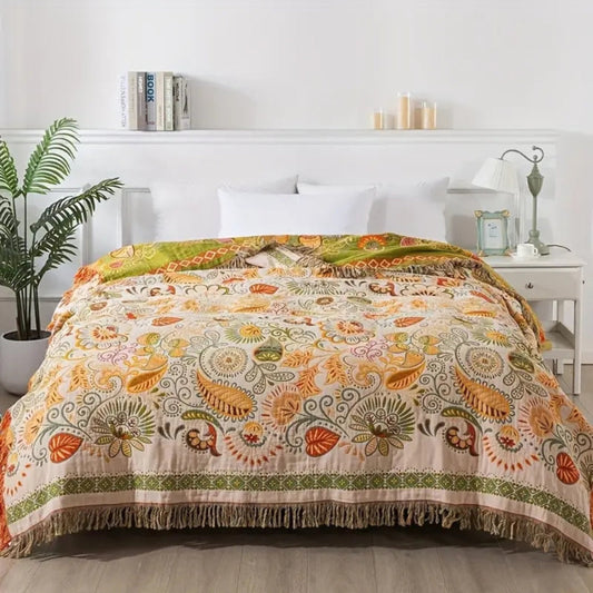 Baumwolldecke Boho – Wendeplaid mit floralem Muster und Fransen