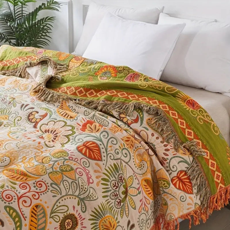 Baumwolldecke Boho – Wendeplaid mit floralem Muster und Fransen