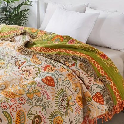 Baumwolldecke Boho – Wendeplaid mit floralem Muster und Fransen