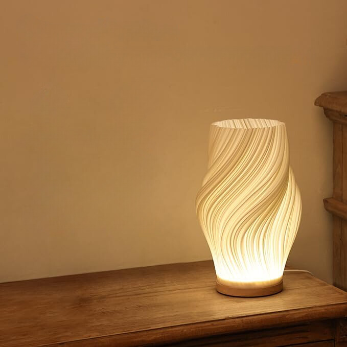 LED-Designlampe in Wellenform als stimmungsvolle Tischbeleuchtung