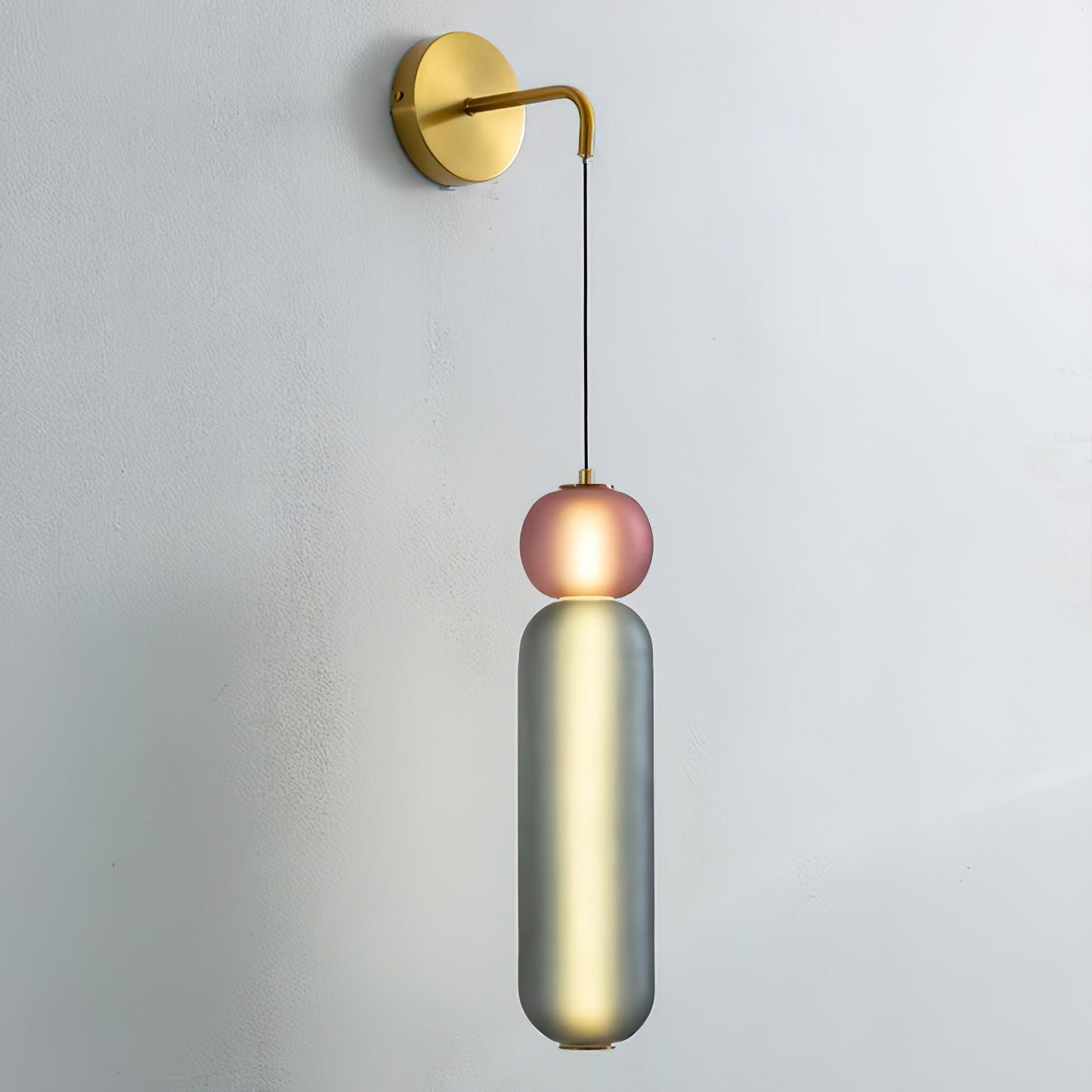 Wandlampe mit Goldfinish und Ornamenten