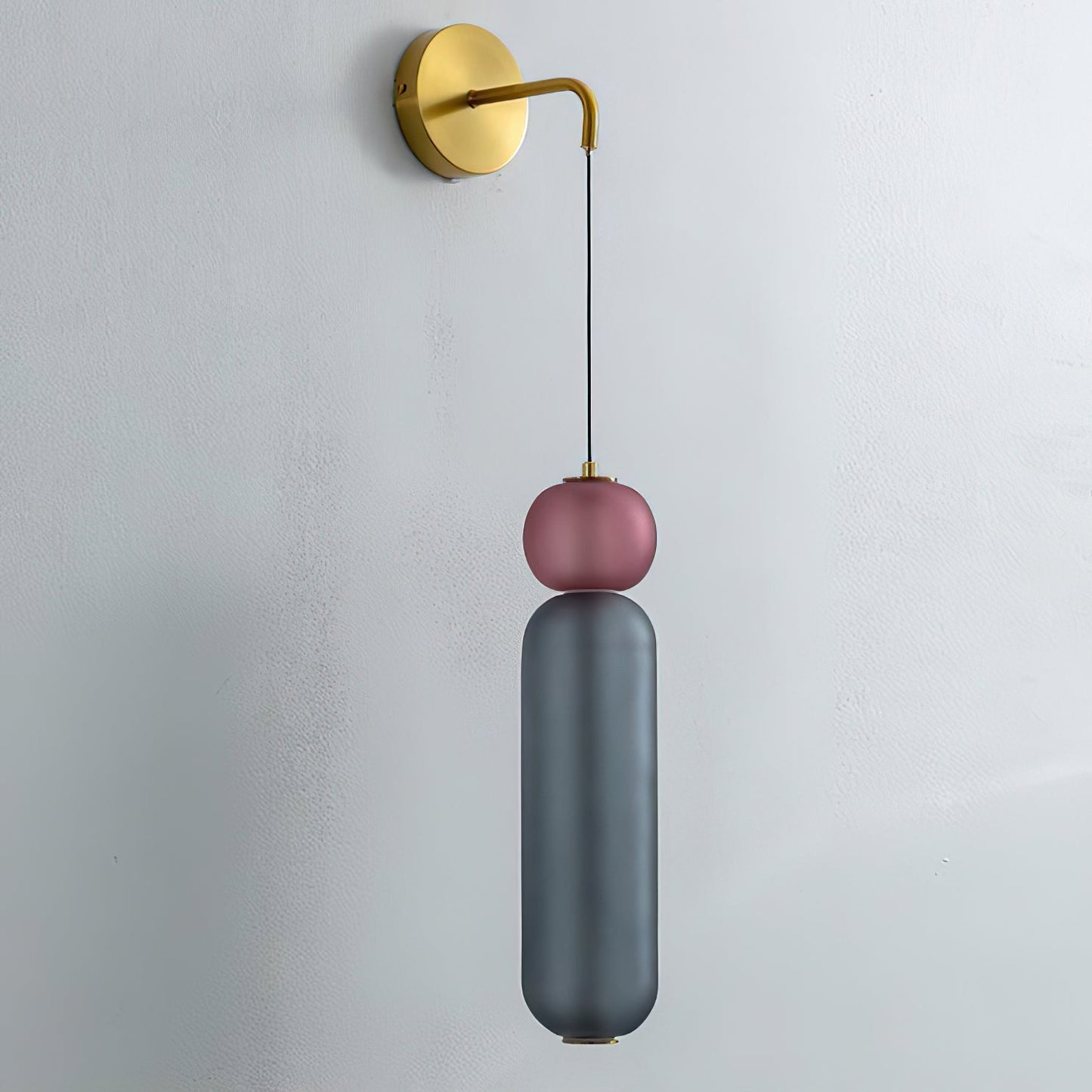 Wandlampe mit Goldfinish und Ornamenten
