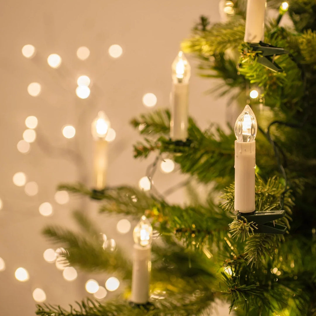 Lange Lichterkette mit warmweißen LED-Clipkerzen für den Weihnachtsbaum
