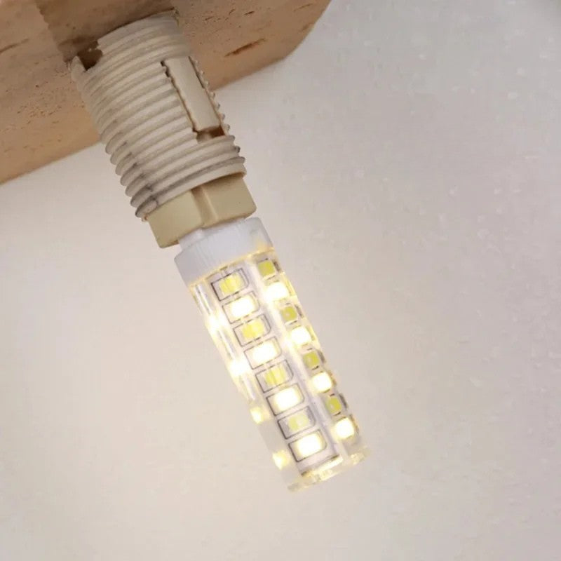 LED-Wandleuchte mit Steinsockel und Kugelglas für stilvolle Innenräume