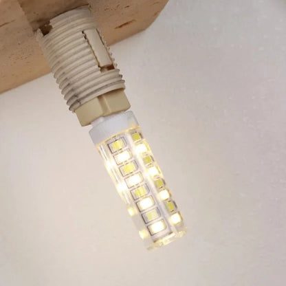LED-Wandleuchte mit Steinsockel und Kugelglas für stilvolle Innenräume