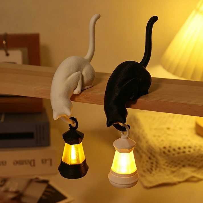 Seitliche Ansicht einer Katzenlampe mit hängendem Leuchtelement