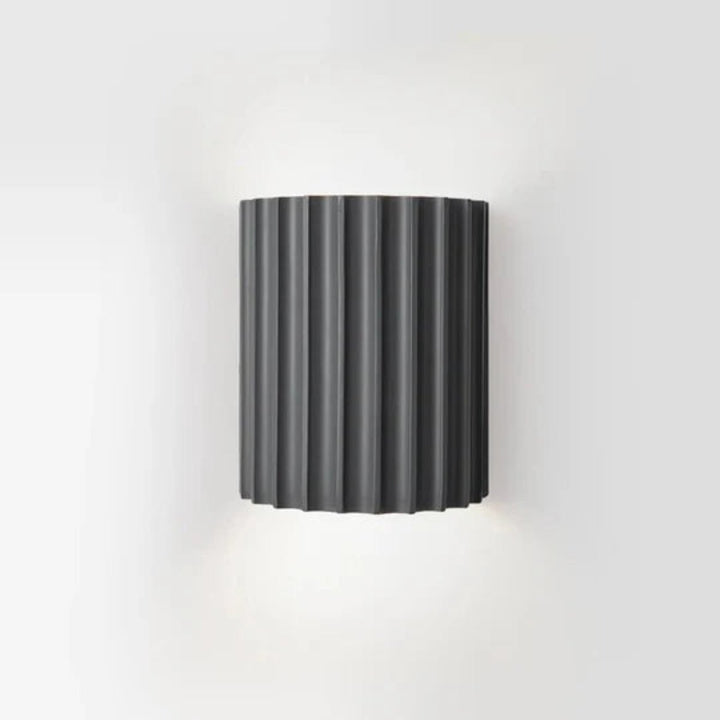 Moderne LED-Wandleuchte in gerippter Zylinderform für Innenräume