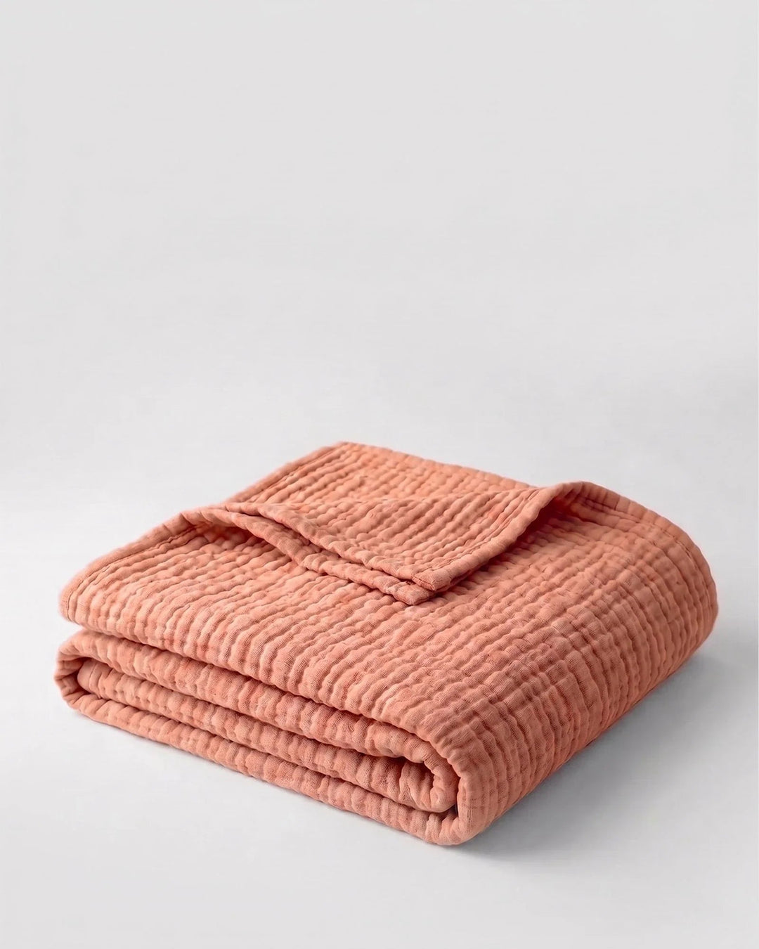 Elegante Wohndecke aus atmungsaktivem Musselin im Wohnbereich