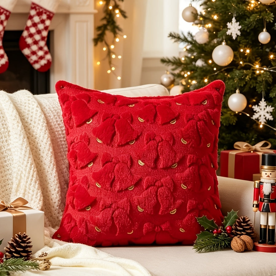 Kissenhülle mit festlichem Glockenmotiv im 3D-Strickdesign