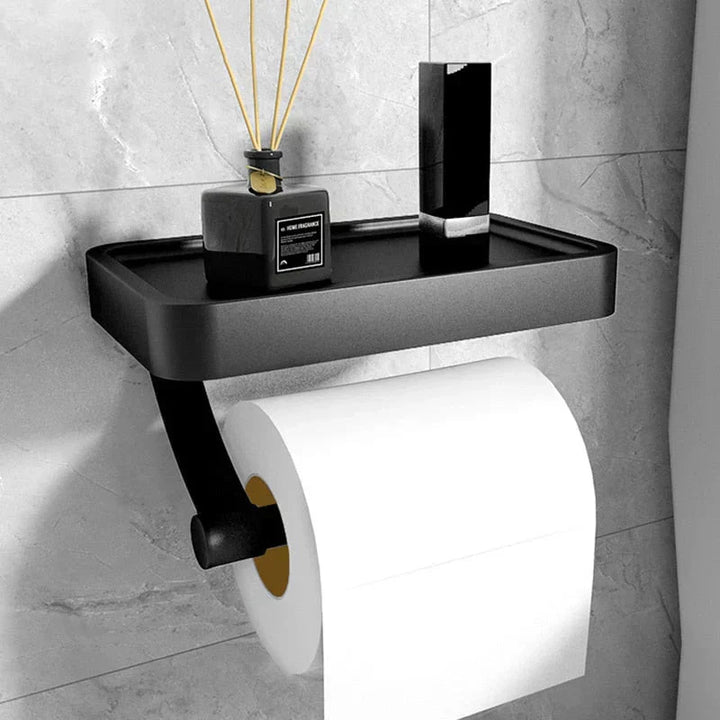 Toilettenpapierhalter aus Edelstahl mit integrierter Ablage an weißer Wand